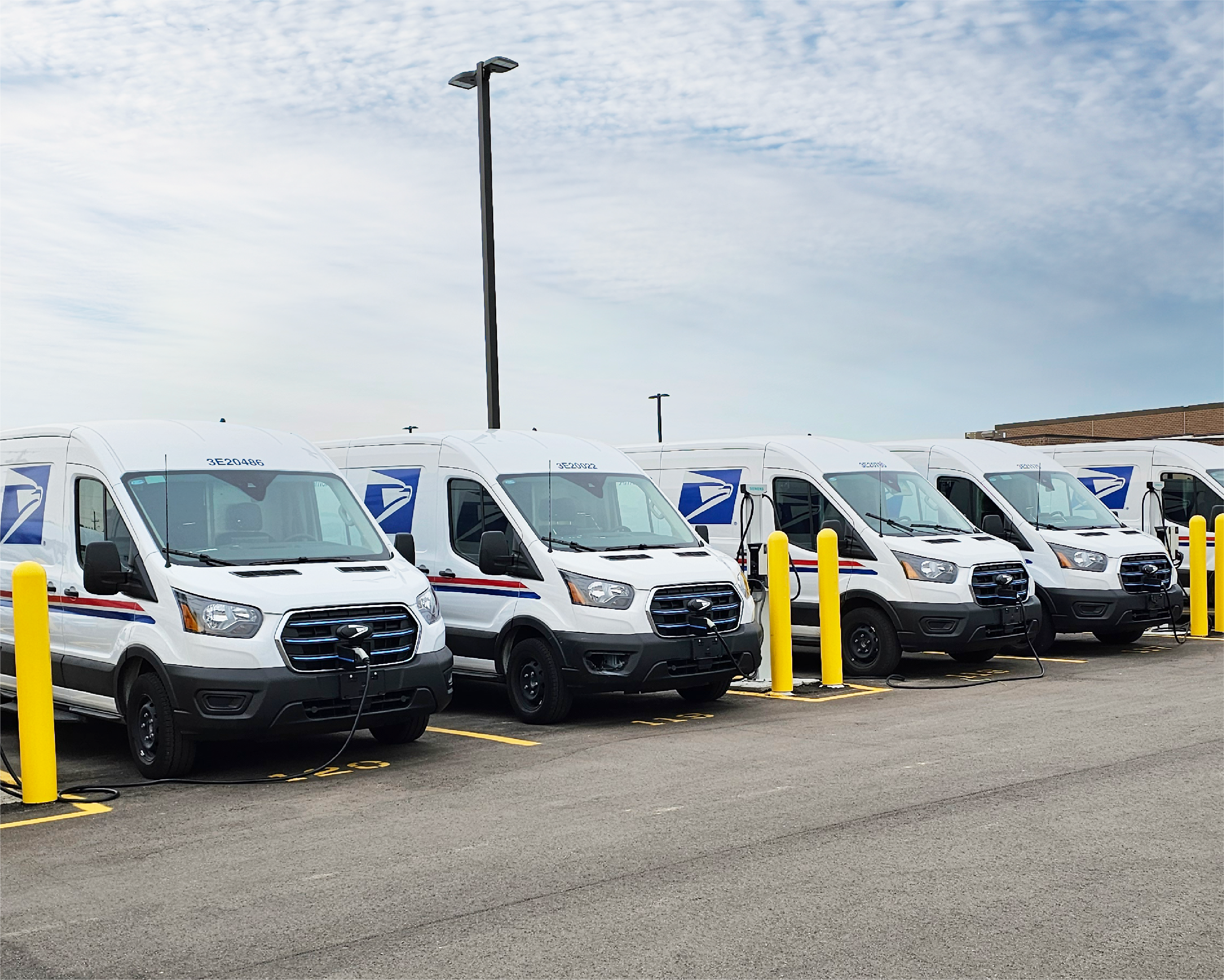 Cover image: photo of EVs in the Topeka S&DC parking lot. 