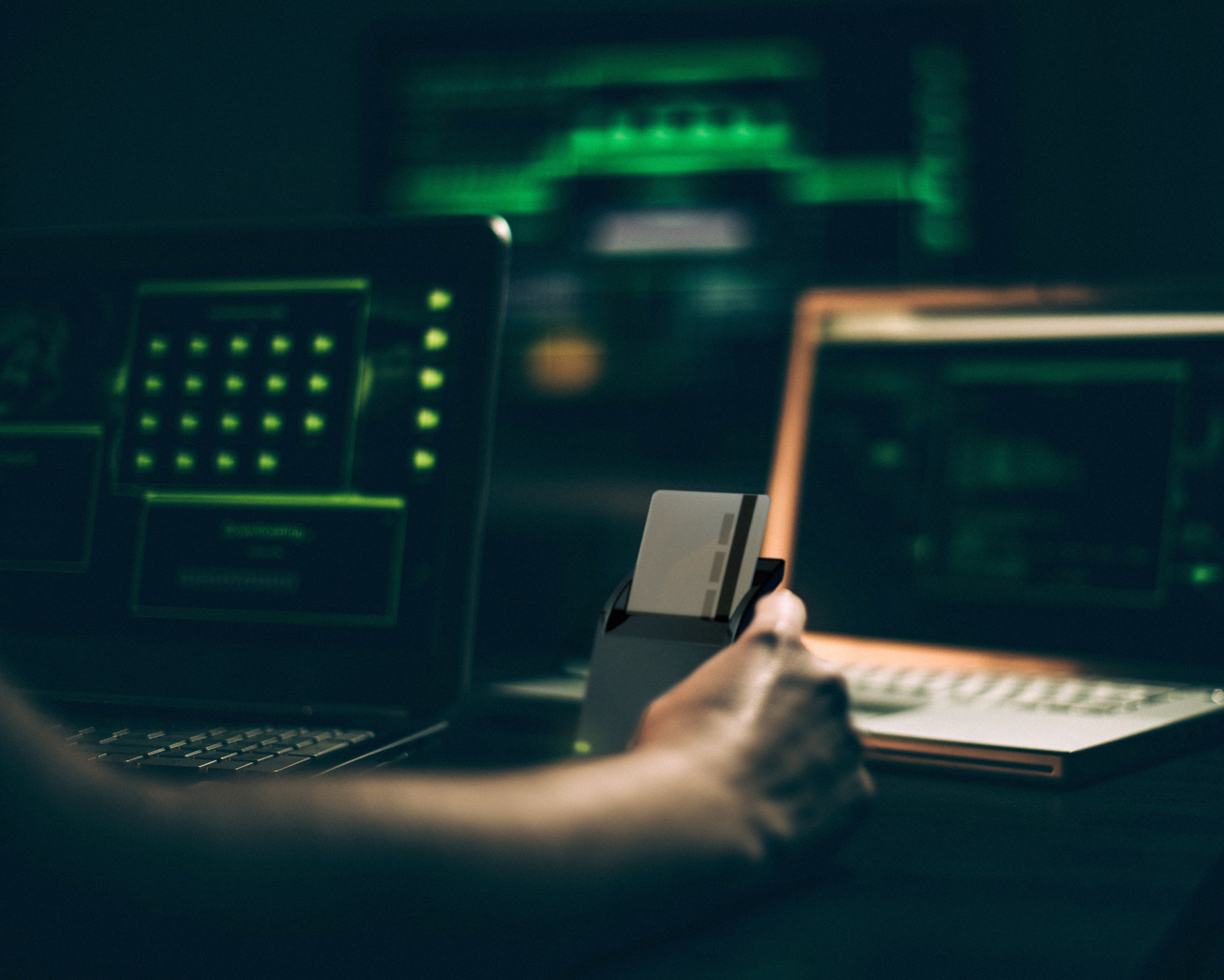 Photo of a laptop computer being used by a person. 