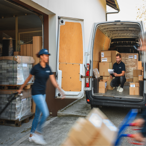 cover image: photo of workers moving packages. 