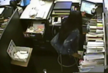 The employee then places the money order in the printing machine.