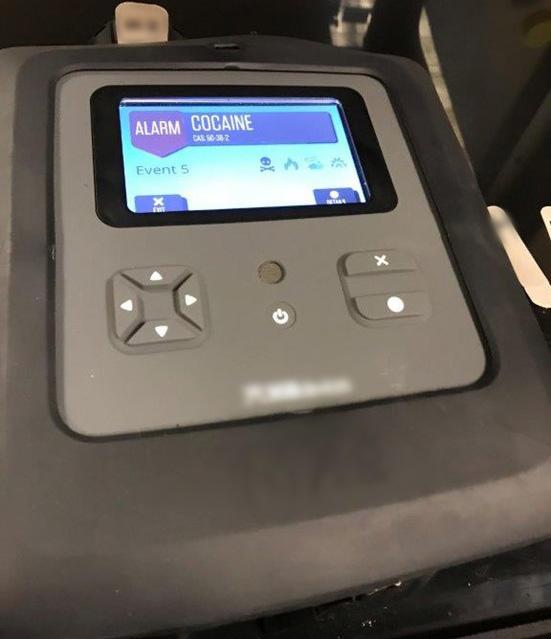 Instrument showing a cocaine alarm on the panel screen.