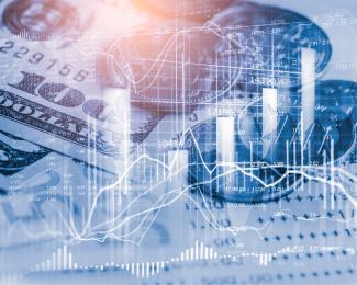 Photo illustration of money and financial charts. 