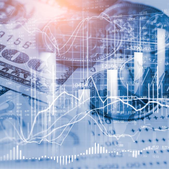 Photo illustration of money and financial charts. 